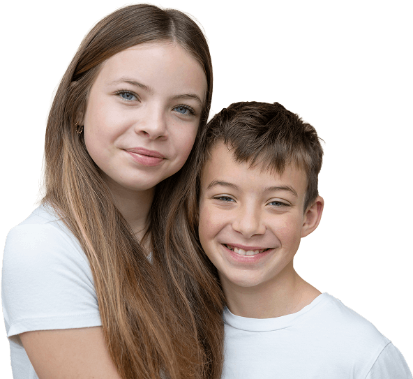 Confident young boy with a backpack, standing and facing forward